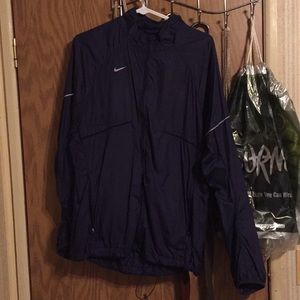 Blue Nike windbreaker